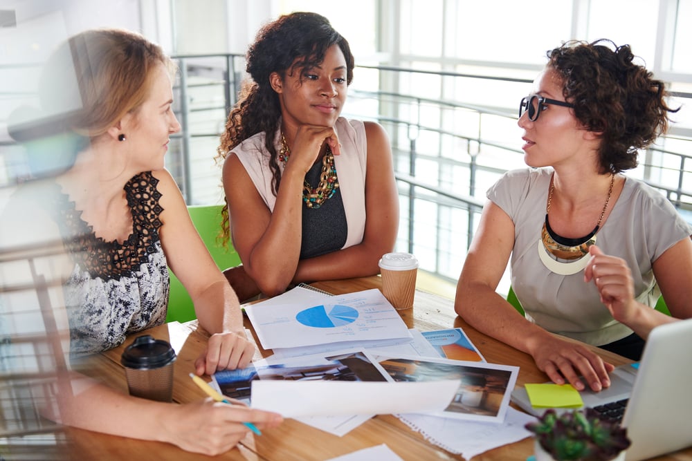 team of successful business people having a meeting in executive sunlit office-2
